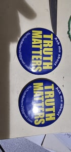 Photo from Scott Evans of their 2.5 Round Custom Buttons with Pinbacks